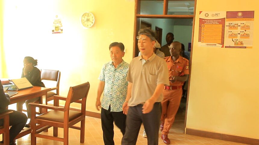 Two South Korean nationals and a Ugandan lawyer remanded.