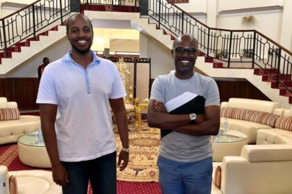 Andrew Mwenda with King Oyo