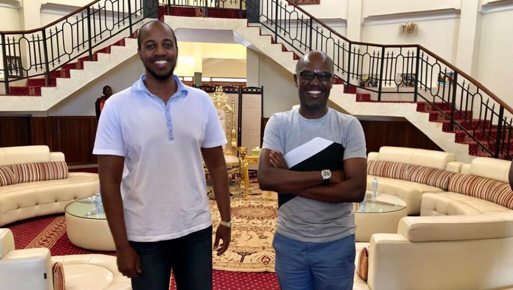 Andrew Mwenda with King Oyo